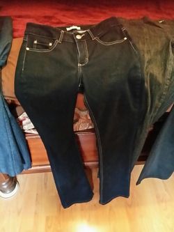 Riders. Mid rise boot cut size 6
