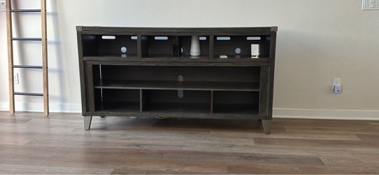 Mathis Brothers Dark Gray Wood TV Stand with Open Shelving