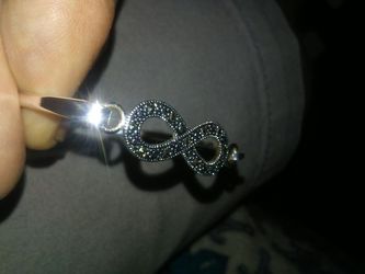 Infinity bracelets. Sterling silver infinity ring
