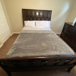 Queen-Sized Bed and Dresser with Mirror Set