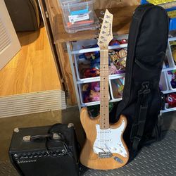 Electric Guitar w/ Amplifier, Guitar Bag and Cord