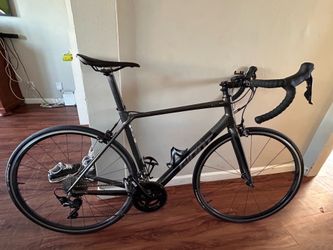 This is a Giant Content road bike with an GIANT CONNECT aluminum frame and Shimano component group.