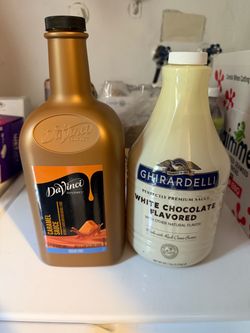 Brand new white chocolate sauce and caramel sauce
