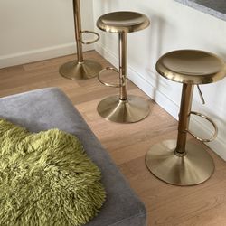 Three Gold Stools