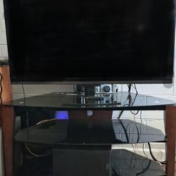 Sanyo 48" TV with Firestick + TV stand