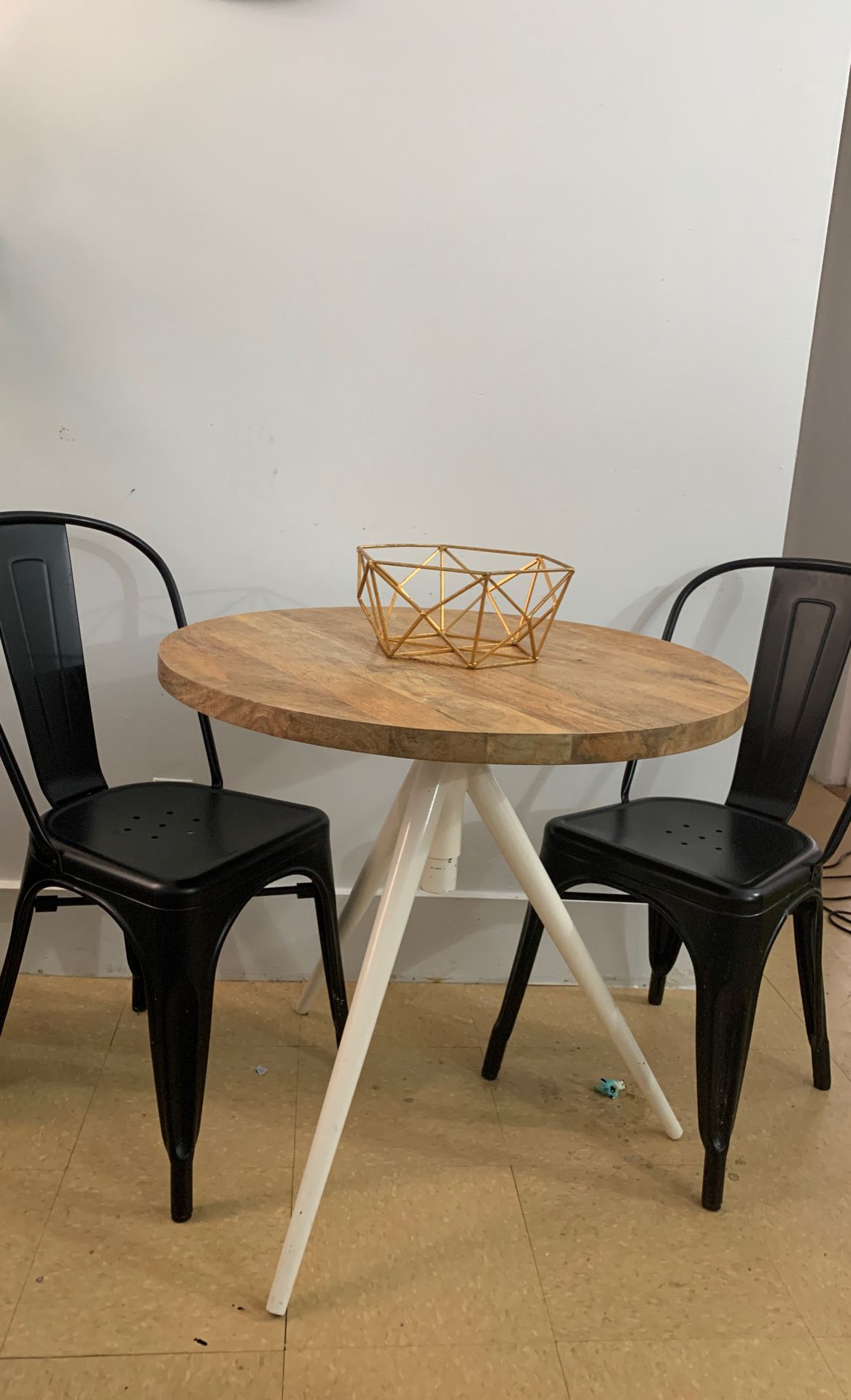 West Elm bistro table with 4 black mid century modern chairs