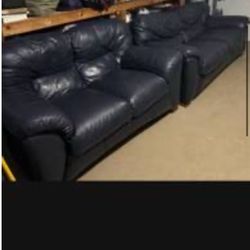 Navy blue sofa and loveseat all leather