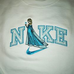 Elsa from Disney s Frozen Custom Nike Embroidered Sweater Crewneck In White for Sale in San Diego CA OfferUp