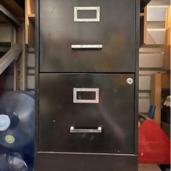Black two drawer file cabinet  27” tall 14 1/2 long 22” wide