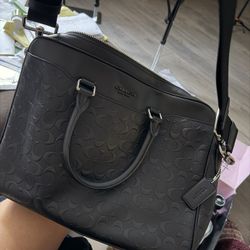 Brand new black Coach briefcase 