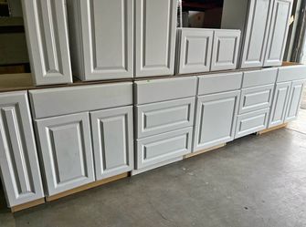 Kitchen cabinets in satin white