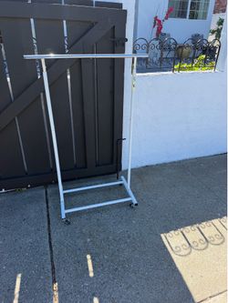 CLOTHES RACK. FREE FIFTY FREE