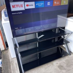 55” Smart Tv And TV Stand 