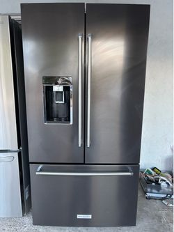 KitchenAid black stainless counter depth fridge works perfect and good condition for delivery to your garage