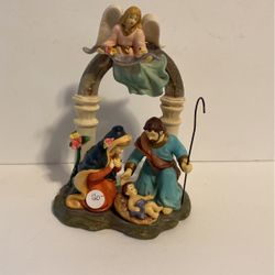 Porcelain nativity figurine by Avon 2002