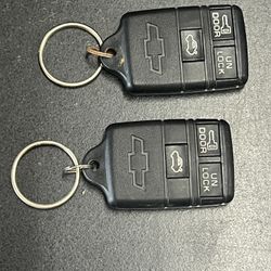 Lot of 2 TRW Chevy Chevrolet Key Fobs ABO 0104T 