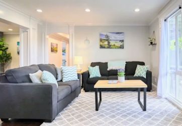 Ashley Furniture Dark Gray Sleeper Sofa and Love Seat