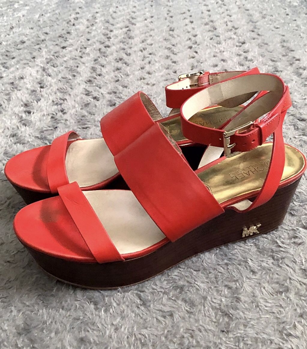 Michael Kors wooden wedges size 10M Retail $185 Super cute. Great condition! Color orange leather upper, rubber outsole . Approx. 1” front & Wedges 3