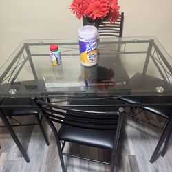 Glass top dining table
