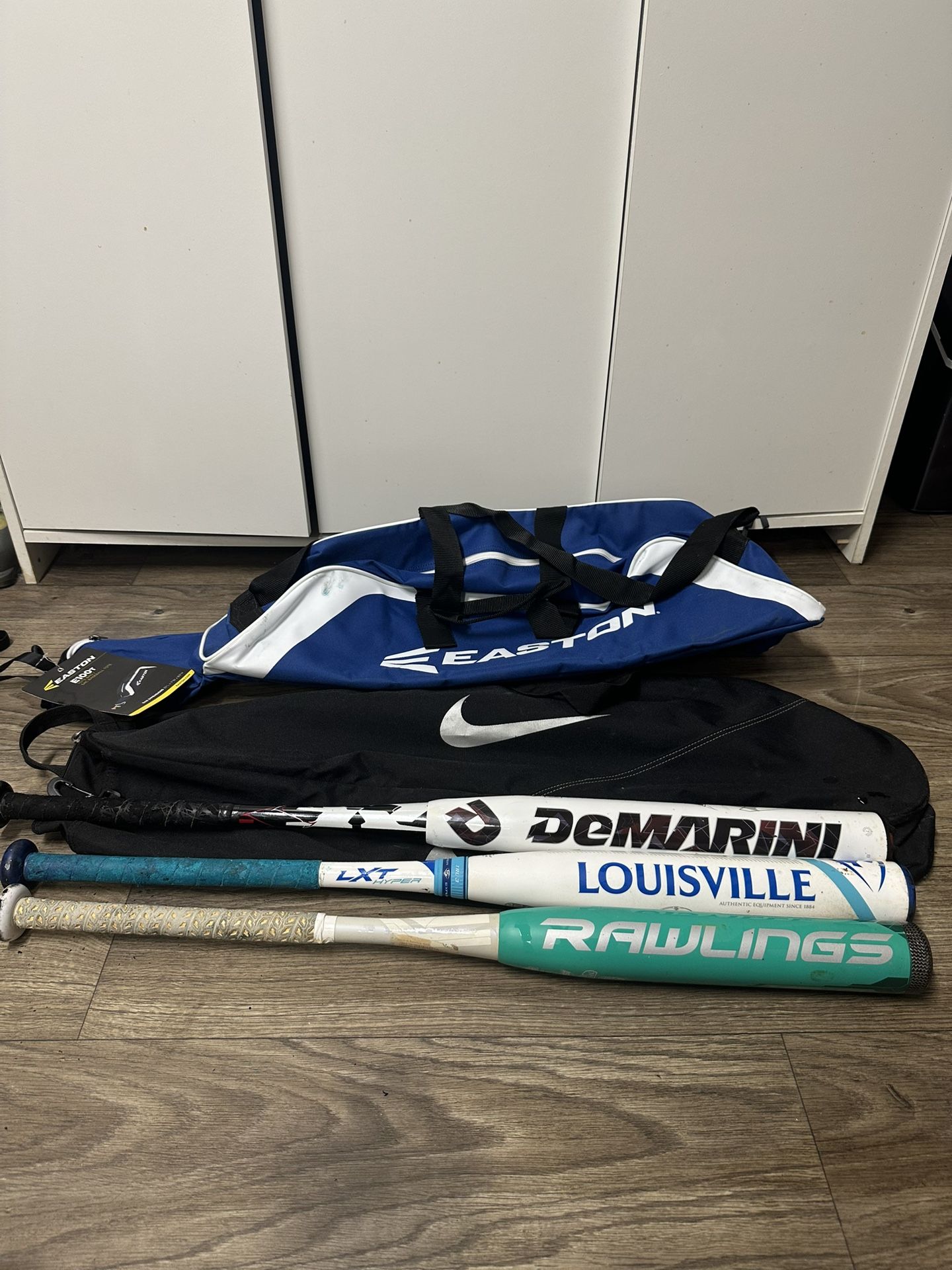 Baseball Bats And Bags All Together