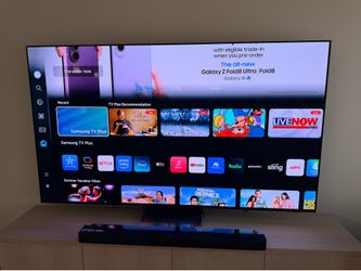 Samsung 77-inch OLED S90C4K Smart TV and Bose soundbar.