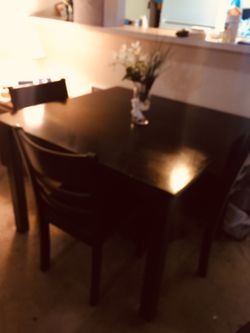 Black wooden Dining table and 3 chairs