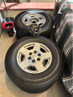 2004 Chevy Tahoe OEM wheels and tire’s