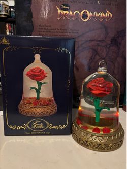 Beauty and the beast and enchanted Rose snow globe