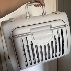 2  small pet carriers