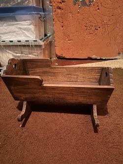 Handmade wooden doll cradle