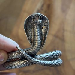 heavy sterling silver cuff offem associated with Naga Indian symbolism 