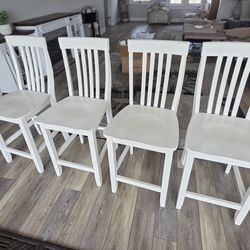White wood counter height chairs