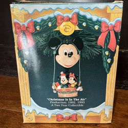 Enesco Mickey & Minnie Mouse Christmas Is In The Air Ornament. Two Year Collectible. Production: 1992, 1993. Vintage. Brand New In Original Box