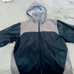 Columbia rain jacket with retractable hood.
