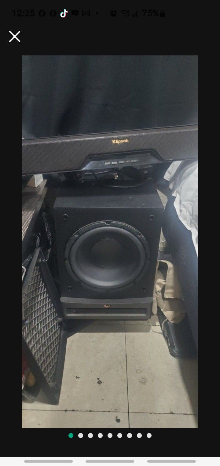 KLIPSCH BLUETOOTH SOUNDBAR AND BASS BOX. SOUND EXTREMELY GOOD.