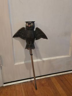 Metal owl on stick