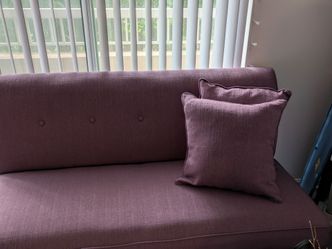 MOVING SALE $250 OBO/NEG: Beautiful Purple Linen Armless couch . Retails 1700