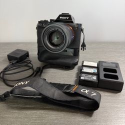 Sony Alpha A7 Camera Bundle (body, 55m f/1.8 lens, grip, batteries, charger)