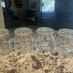 Tito’s handmade canister set of four with snap lids brand new never been used