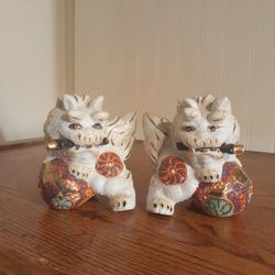 Vintage Set of 2 Porcelain Gilded Foo Lions With A Sword in Their mouth.  5" Tall 