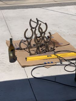 Reclaimed horseshoe wine rack