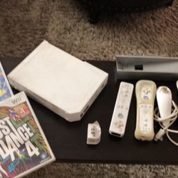 Nintendo Wii System With Conrollers A Couple Games.