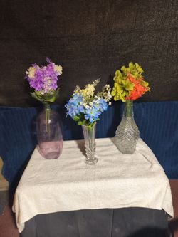Vases of flowers