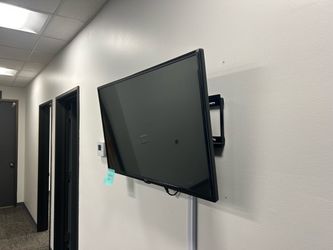 42” LG TV with wall mount