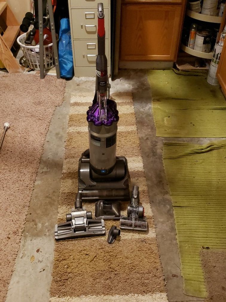 Dyson DC-17 Animal.... Old vacuum works but main tube isn't completely connected to the bottom of vacuum. All the main parts still work.
