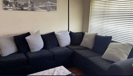 Black and brown sectional couch
