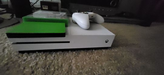 X box one s with 2tb game drive , wireless controller