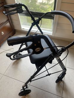 DRIVE rollator walker for seniors with seat/storage