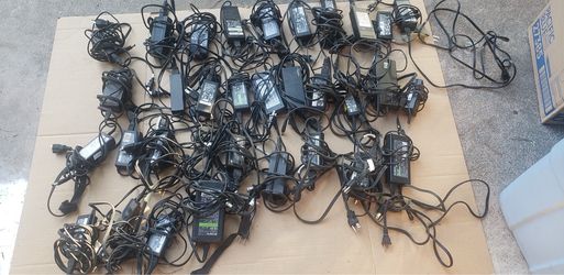 Lot of 32 laptop power supplies. Hp, dell lenovo toshiba, sony.