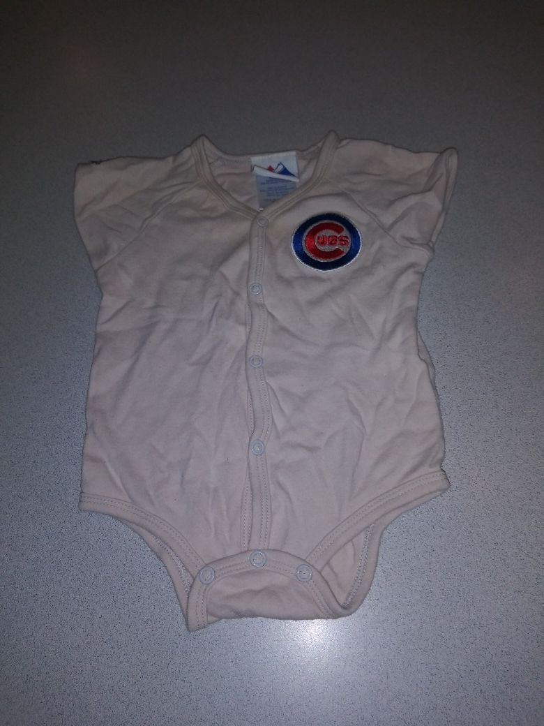 6/9 MONTH ONESIE FROM MAJESTIC WITH SEWN ON LOGO